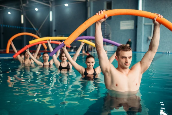 Group doing a workout class in the pool